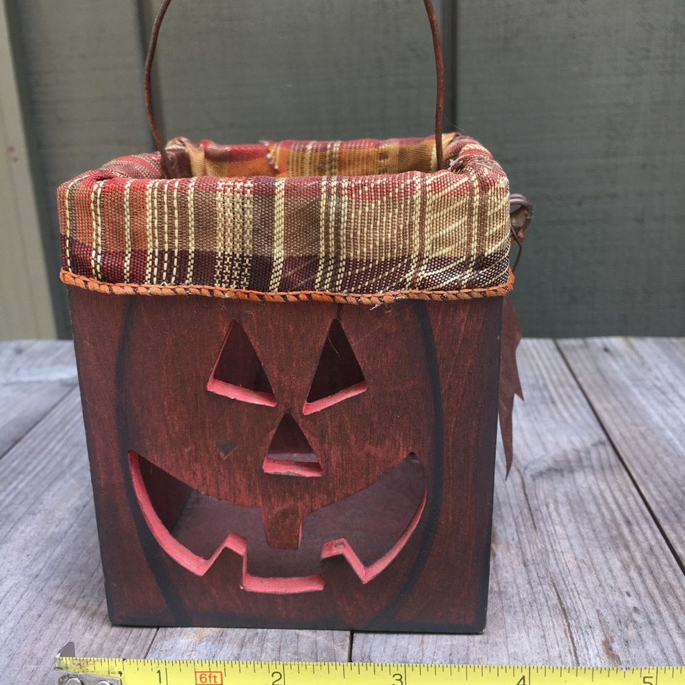 Wooden pumpkin-faced box decor